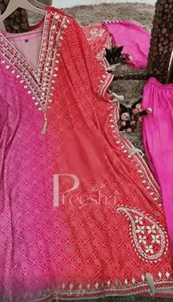 Red and pink printed kaftan with paisley embroidery